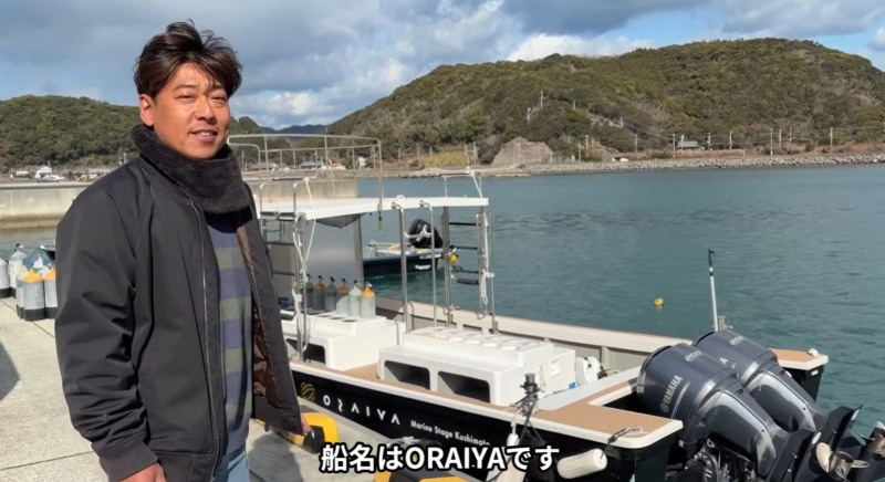 こだわりの新艇の説明をする谷口さん